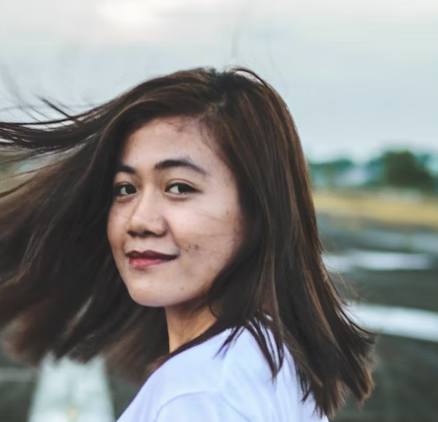 Woman with windblown hair